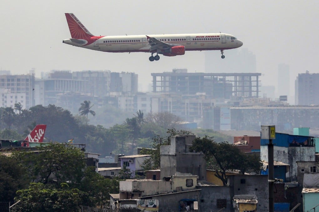 An Air India passenger jet prepares to land at an airport in Mumbai. China has simplified visa rules for Indian nationals as part of an effort to rebuild economic ties between the two nations. Photo: EPA-EFE
