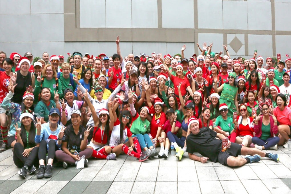Festively dressed participants hit the streets to take part in the annual Santa Hash charity run. Photo: Handout