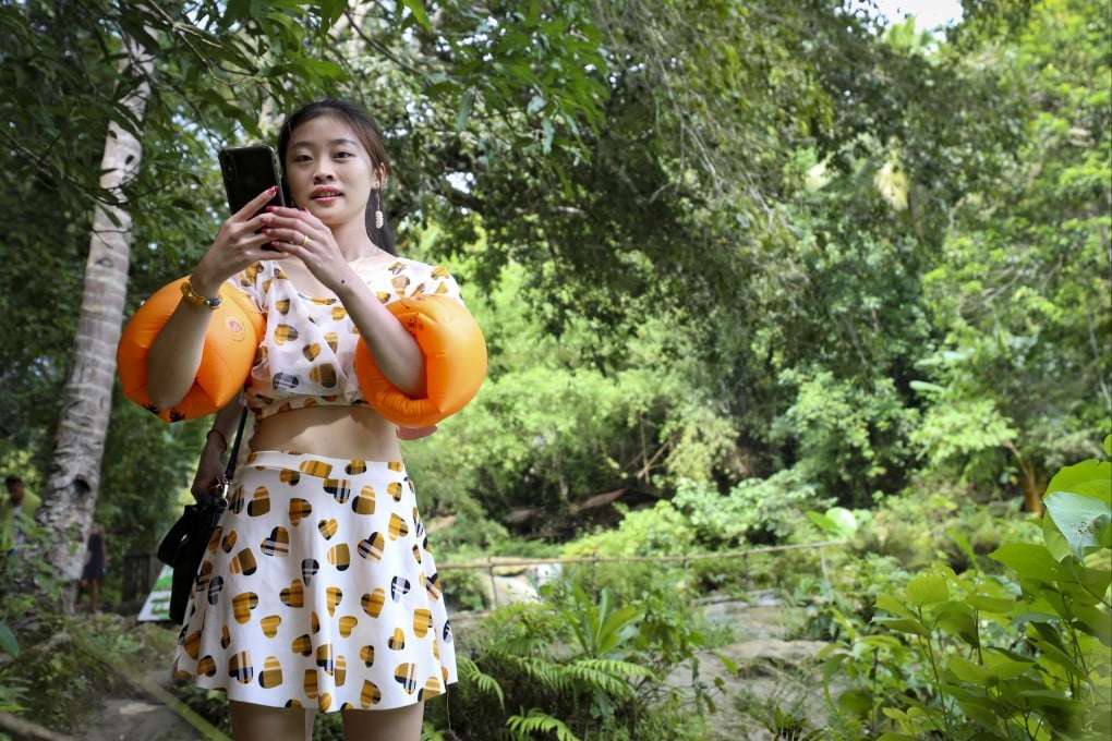 Chinese tourists from Beijing enjoying Cambugahay waterfalls in Siquijor, Central Visaya, Philippines. Photo: SCMP / James Wendlinger