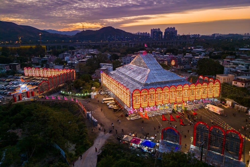 The giant bamboo scaffold at Kam Tin is lit up at sunset during the Jiao Festival, which is held once every 10 years, on December 15. Photo: Eugene Lee