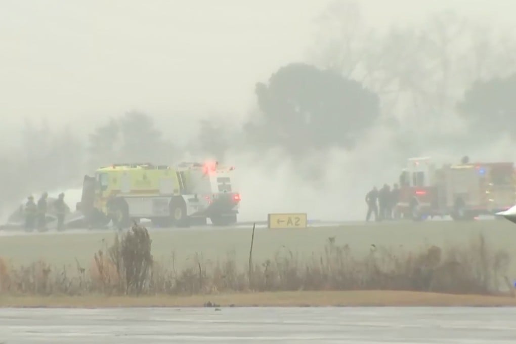 Firefighters respond to a plane crash at a regional airport in Statesville, North Carolina, on Thursday. Photo: WSOC via AP