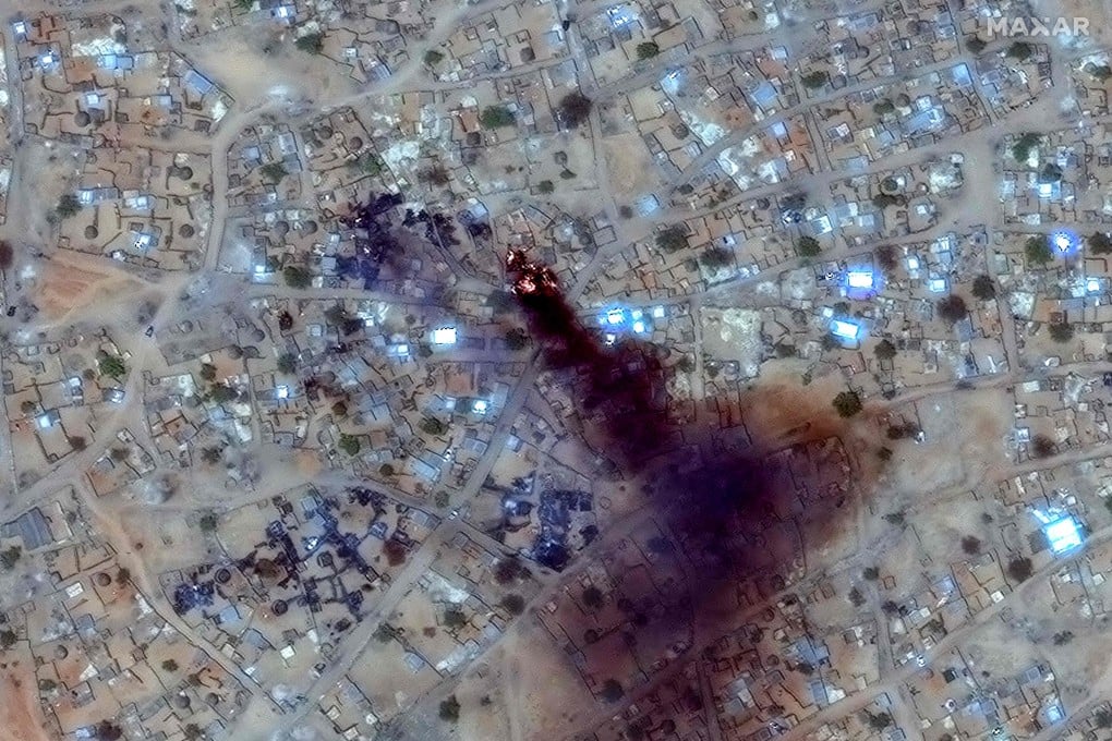 Fire and smoke at Zamzam camp near the besieged Darfur city of El-Fasher in April, where Sudan’s RSF carried out an attack that killed hundreds. Photo: Maxar Technologies via AFP