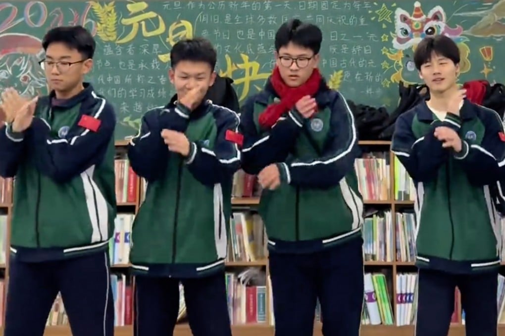 A teacher in China has turned a group of tardy boys into a “wrongdoers boy band” and made them dance on a podium to outdated music as punishment. Photo: Douyin