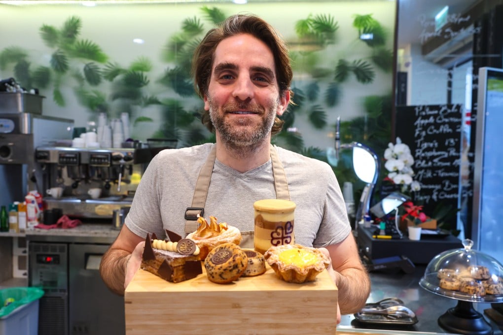 Canadian baker Domenico Giammarella hold various pastry items at Mimmo, in Hong Kong’s Quarry Bay neighbourhood, where he infuses Asian-inspired pastries with his French and Italian heritage. Photo: Edmond So