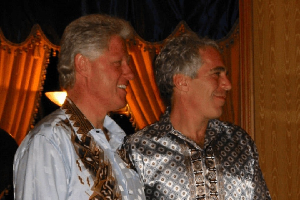 Former US President Bill Clinton stands with Jeffrey Epstein in this image released on Friday. Photo: US Department of Justice via Reuters