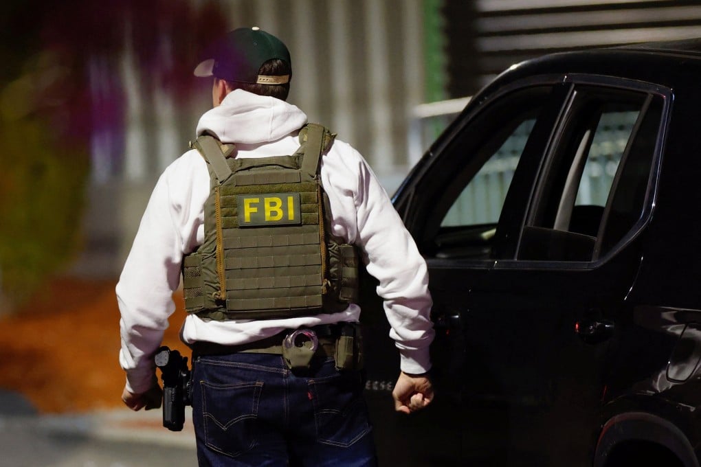 Law enforcement agents take part in the search for the Brown University shooter in Salem, New Hampshire, on Thursday. Photo: Reuters