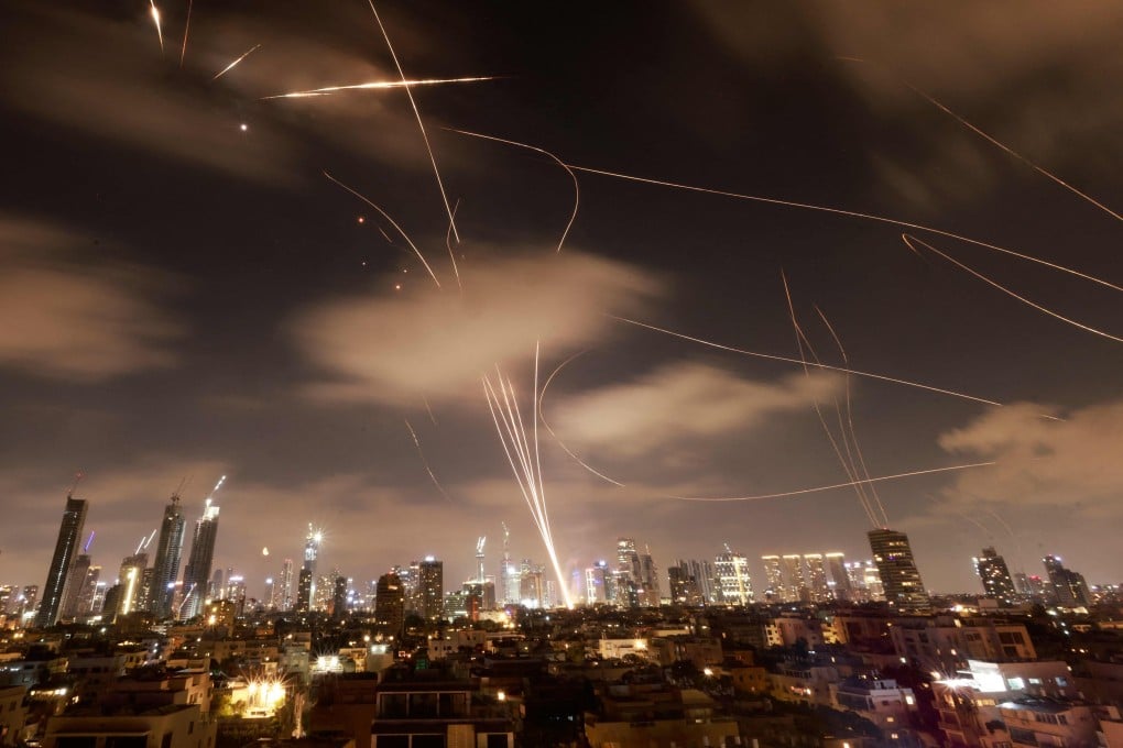 Israeli air defence systems intercept Iranian missiles over the Israeli city of Tel Aviv early on June 18. Photo: AFP