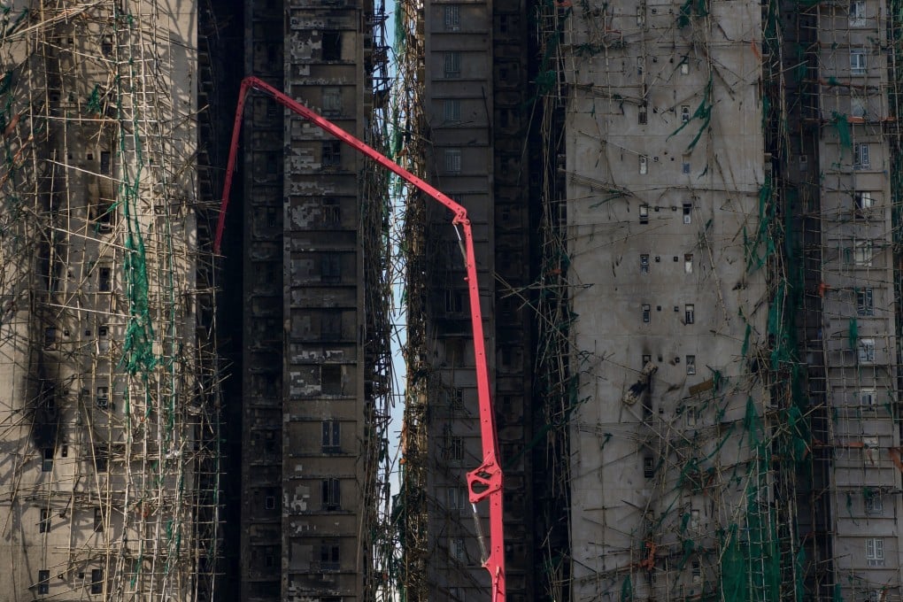 Flammable foam panels used to seal windows and nets that failed fire-retardant tests are believed to have fuelled the blaze’s rapid spread across seven of Wang Fuk Court’s eight blocks. Photo: Karma Lo