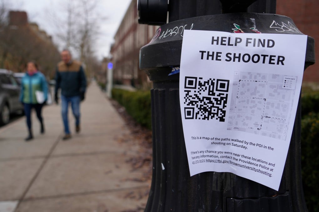 A poster seeking information about the shooting suspect is seen on the campus of Brown University on Wednesday. Photo: AP