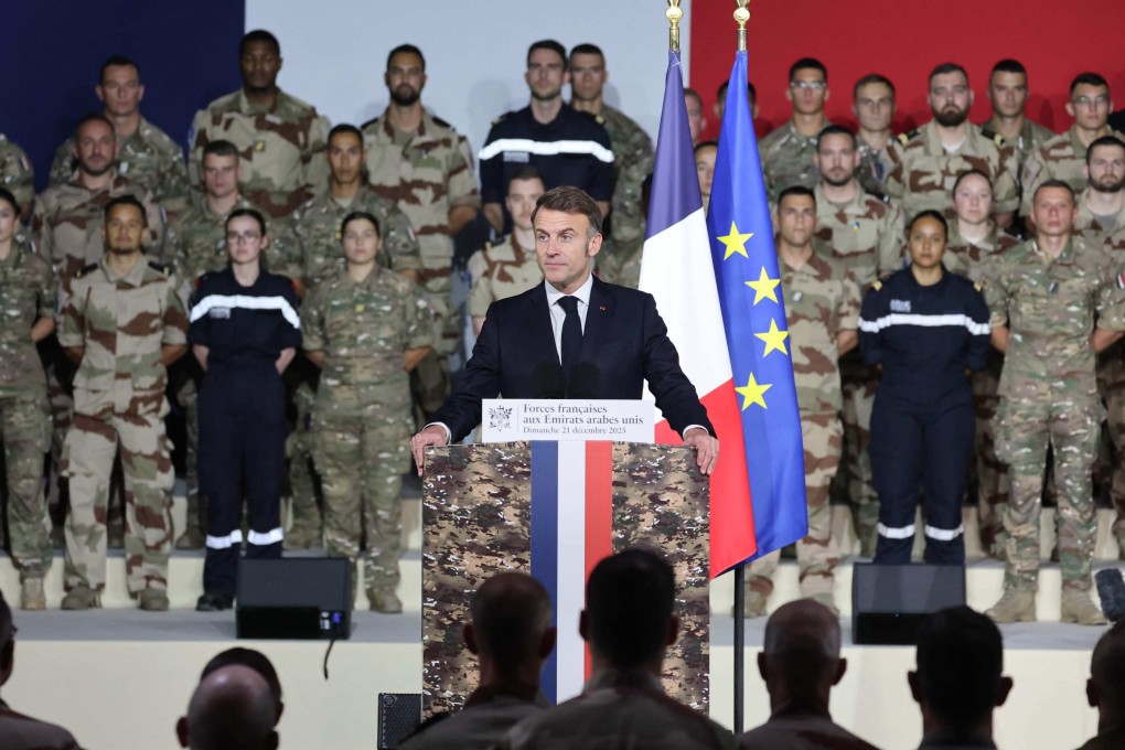 French President Emmanuel Macron addresses French troops in Zayed Military City, near Abu Dhabi, UAE on Sunday. Photo: AFP