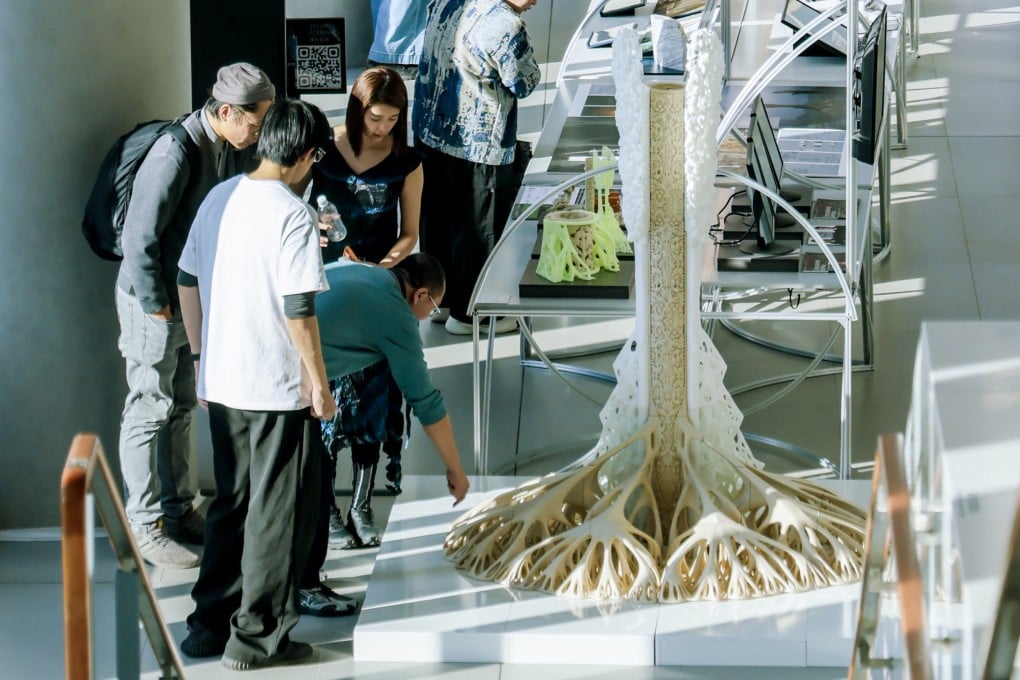 Visitors view a display at the 2025 Hong Kong Shenzhen Bi-City Biennale of Urbanism\Architecture exhibition at the East Kowloon Cultural Centre. Photo: eKCC