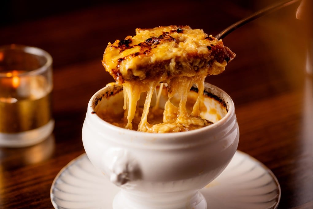 rench onion soup gratinated with Salers, Comté and Gruyère cheese at Somm. Photo: Handout
