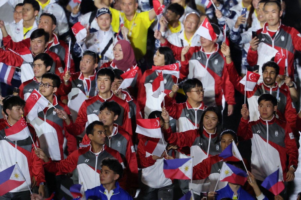 Team Singapore marches during the parade of athletes at the SEA Games’ closing ceremony in Bangkok on Saturday. Photo: Reuters