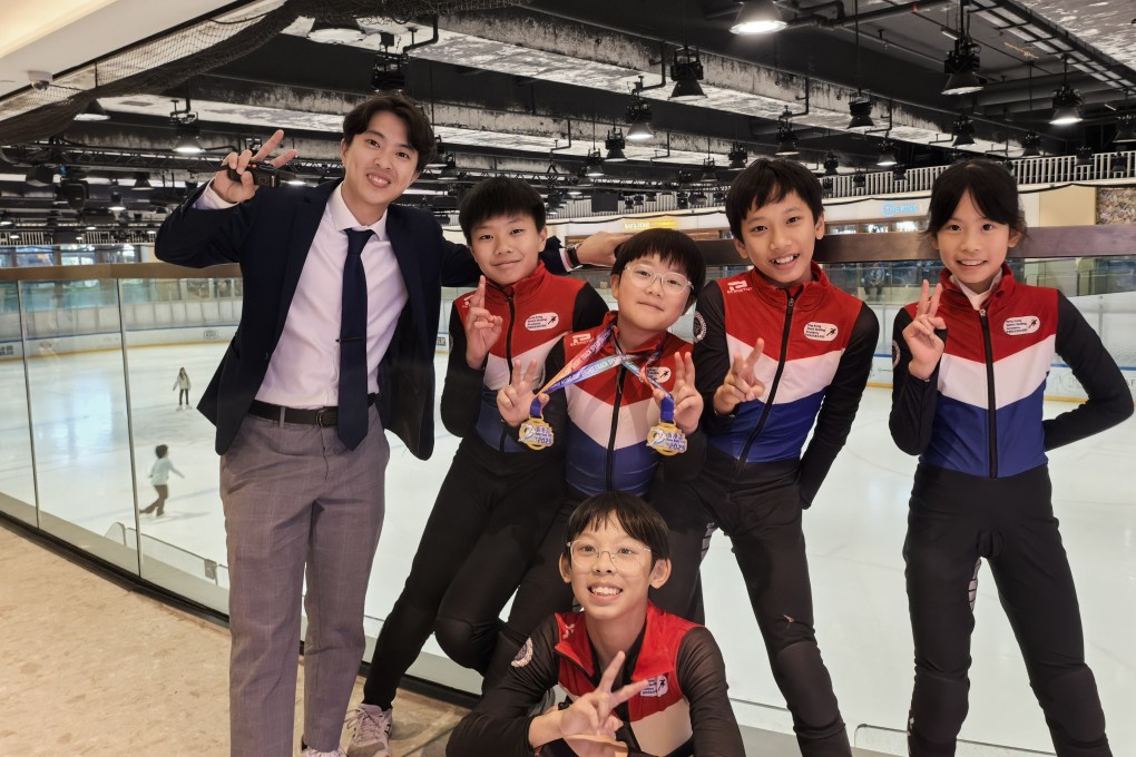 Hong Kong’s 2022 Olympics speed skater Sidney Chu with several young skaters, including Jamie Wan (second from right), at the Hong Kong Cup in Discovery Bay on Tuesday. Photo: Ada Li