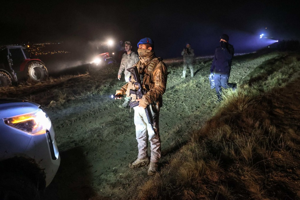 Turkish soldiers stand guard near the wreckage a Libya-bound business jet near Ankara. Photo: AFP