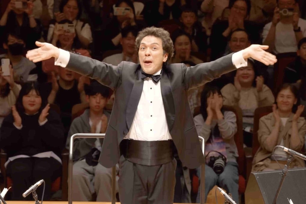 South Korea’s “dancing conductor” Baek Yoon-hak uses his energy-filled moves to get the whole audience joining in.