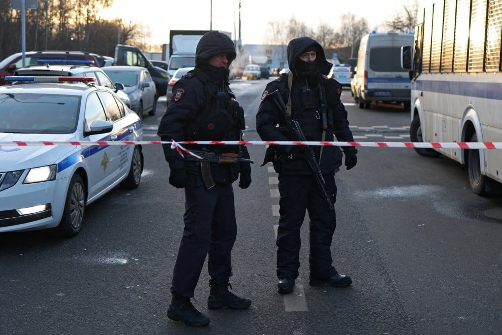 Law enforcement officers block the road near the scene of Wednesday’s deadly explosion. Photo: Reuters
