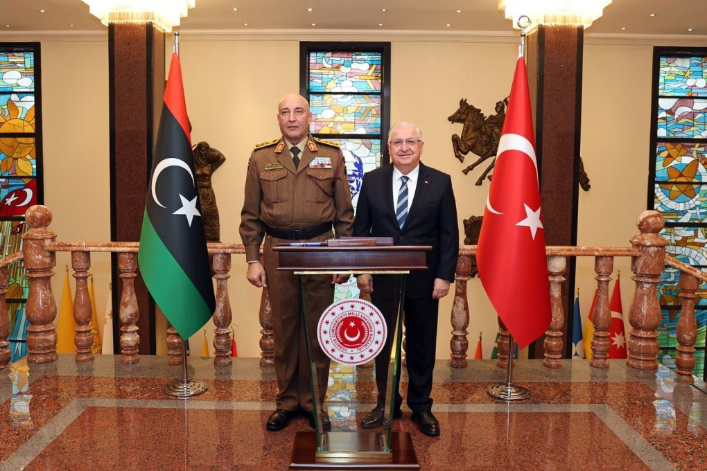 Libya’s General Muhammad Ali Ahmad al-Haddad (left) is seen with Turkey’s Defence Minister Yasar Guler in Ankara on Tuesday. Photo: Turkish Defence Ministry via AP