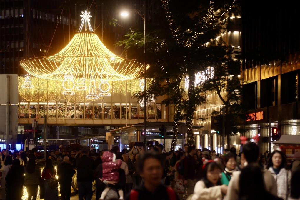 Colourful Christmas lights managed to attract photoseekers. Photo: Jonathan Wong