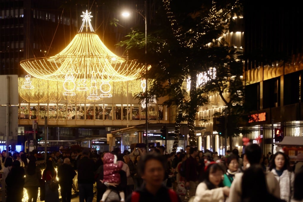 Colourful Christmas lights managed to attract photoseekers. Photo: Jonathan Wong