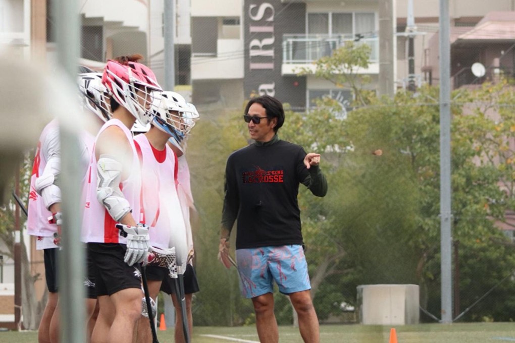 Japanese lacrosse coach Takeshi Sato with the Hong Kong team. Photo: HKLAX
