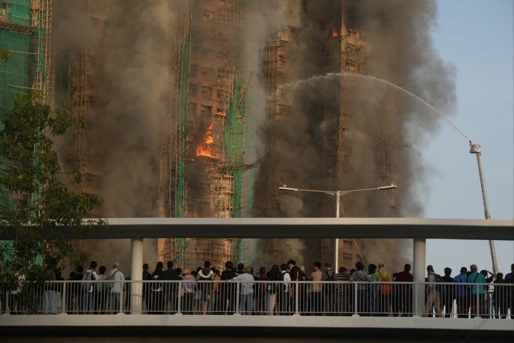 The fire, which raged for 43 hours, killed 161 people, including a firefighter, and displaced nearly 5,000 residents. Photo: Sam Tsang