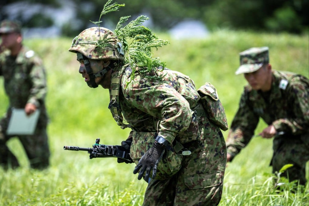 Japanese ground troops take part in an exercise in Okinawa prefecture in June. Chinese state media says the resurgence of Japanese militarism has dealt a serious blow to bilateral relations and undermined regional peace and stability. Photo: AFP