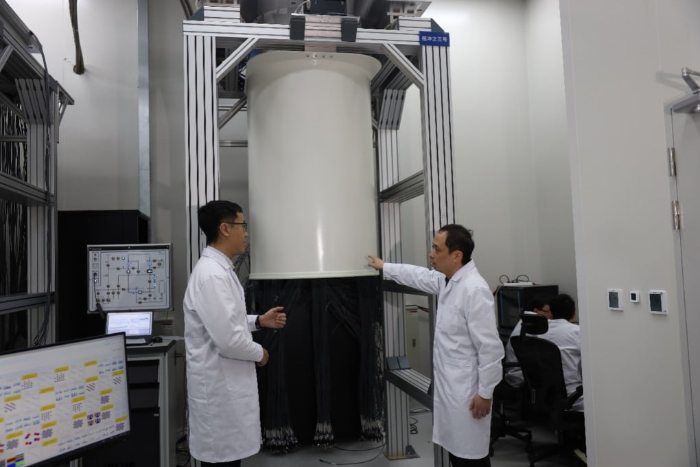 Researchers at the University of Science and Technology of China, in the central province of Anhui, stand in front of the Zuchongzhi 3.2 superconducting quantum computing system. Photo:  Handout
