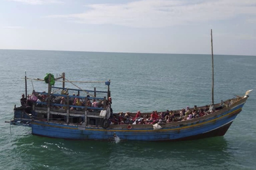 A boat with Rohingya refugees attempts to enter Malaysia from Langkawi in this photo released on January 4. Photo: Malaysian Maritime Enforcement Agency/AP