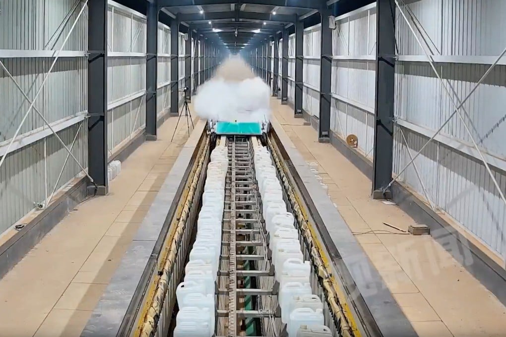 Footage of the test aired by state broadcaster CCTV shows a vehicle flashing across the maglev track, leaving a trail of mist in its wake. Photo: CCTV