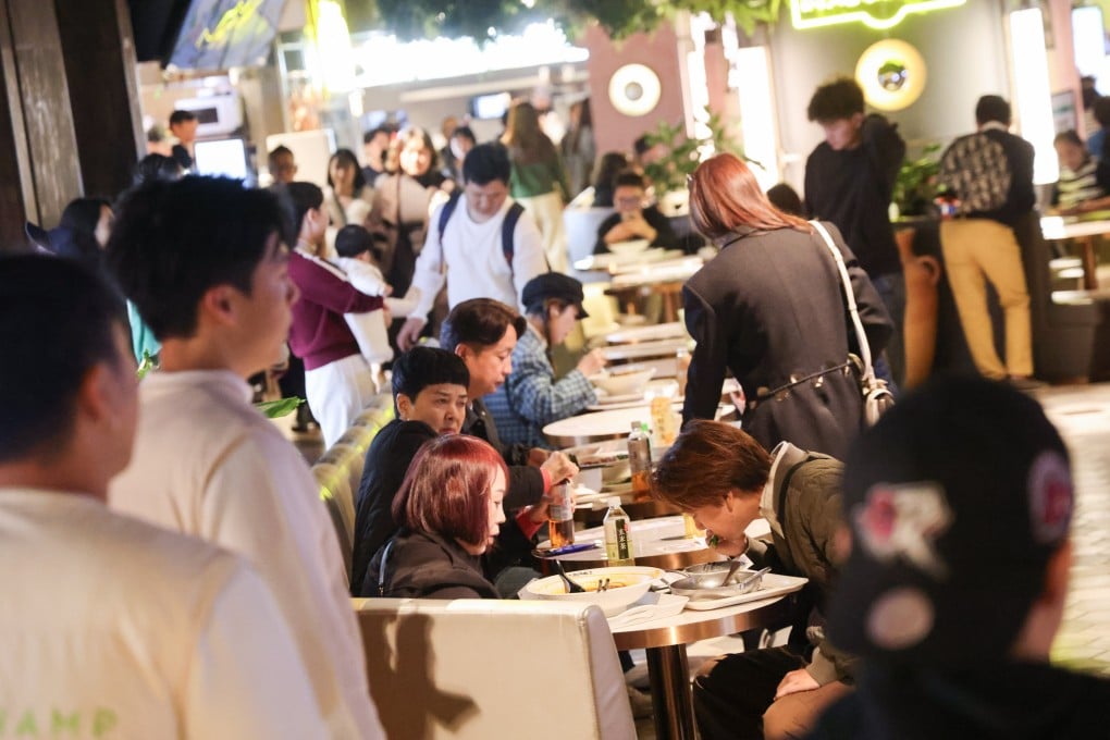 Diners at a restaurant in Tsim Sha Tsui. The city recorded a 10 per cent drop in restaurant sales. Photo: Jelly Tse