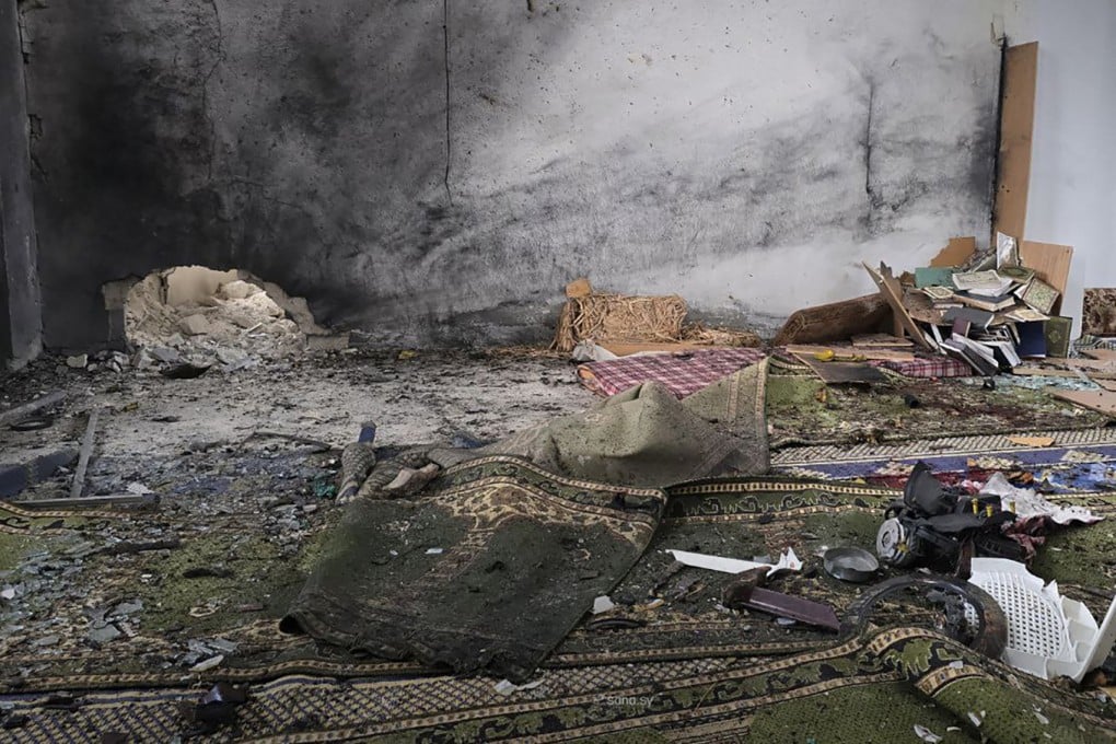 The aftermath of the explosion inside Imam Ali ibn Abi Talib Mosque in the Wadi al-Dahab neighborhood of Homs. Photo: SANA/AFP