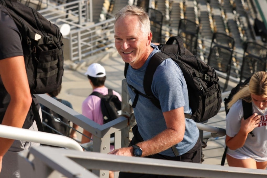 Longevity expert Bill Gifford climbs stairs with a heavy rucksack. Low fitness, in terms of strength and cardiovascular capacity, “is a massive, massive risk factor for early death and disability”, he says. Photo: Bill Gifford