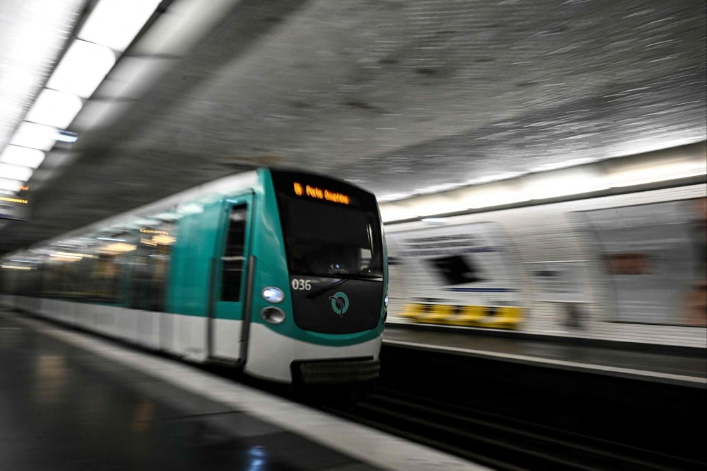 A train entering a Metro station in Paris. Three women were stabbed and wounded at three different Metro stations on Friday, including Opera, Arts et Metiers and Republique. A suspect has been arrested, police said. Photo: AFP