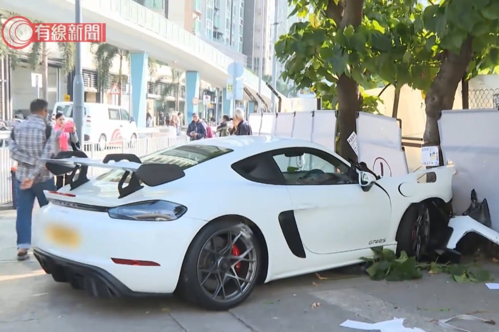 The driver of the white Porsche lost control and crashed through a barricade. Photo: Handout