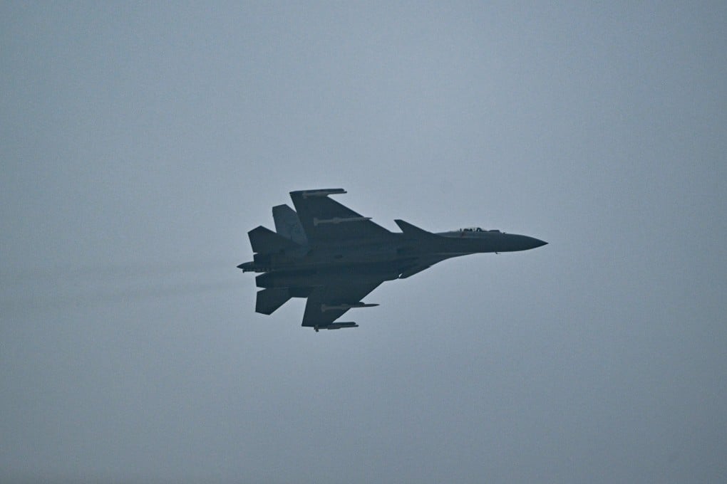 Known as the “Flying Shark”, the J-15 is China’s first domestically developed twin-engined heavy carrier-based fighter jet. Photo: AFP/Getty Images/TNS