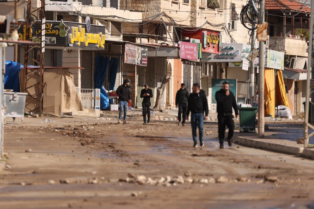 Palestinian men after being released by Israeli troops during a military operation in the Palestinian village of Qabatiya, near the West Bank city of Jenin on Saturday. Photo: EPA