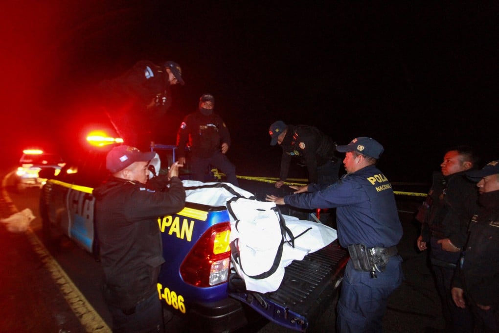 Police officers on the scene after a road accident in Cumbre de Alaska, in Totonicapan, Guatemala killed 15 people on Saturday. Photo: AFP