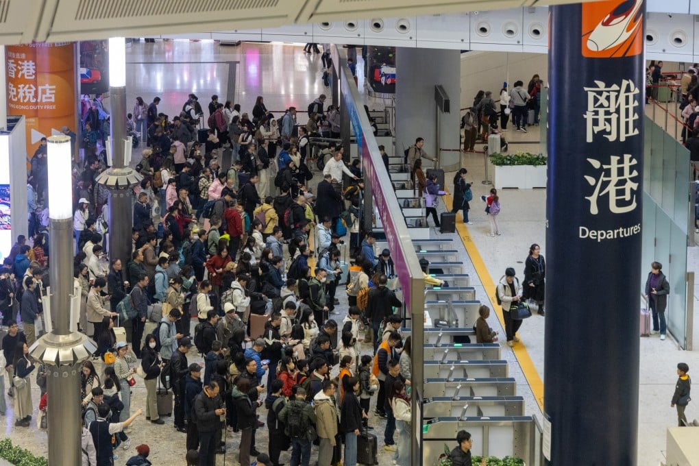 Outbound travellers pack West Kowloon High Speed Rail Station during the Christmas holidays. Photo: Dickson Lee