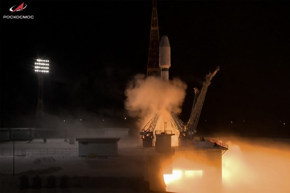A Soyuz-2.1b rocket booster with a number of satellites blasts off from the Vostochny cosmodrome outside the city of Uglegorsk in the far eastern region of Amur, in this screen grab from a live broadcast run by the Russian space agency Roscosmos on Sunday. Photo: Russian Space Agency Roscosmos / AFP / Handout
