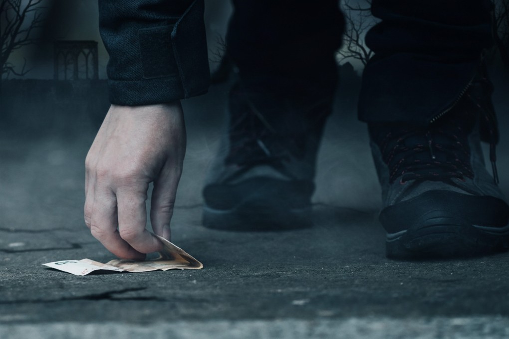 Urban legends warn that picking up a red envelope from the street can unknowingly entangle strangers in life extension rituals, incurring karmic debt. Photo: Shutterstock