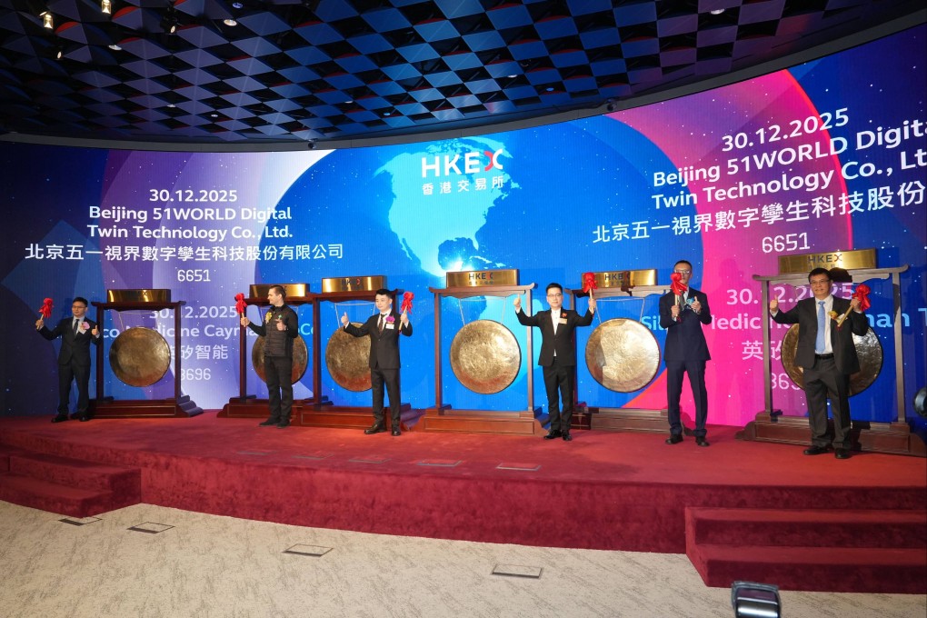 Executives of the six companies celebrate their listings in a gong ceremony at Hong Kong Exchanges and Clearing in Central on December 30, 2025. Photo: Sun Yeung