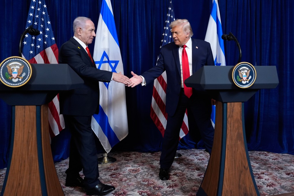 US President Donald Trump, right, shakes hands with Israel’s Prime Minister Benjamin Netanyahu at the end of a news conference at Mar-a-Lago in Palm Beach, Florida on Monday. Photo: AP