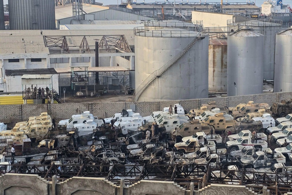 Damaged military vehicles, reportedly sent by the United Arab Emirates to support Southern Transitional Council separatist forces, following an air strike carried out by the Saudi-led coalition in the port of Mukalla, southern Yemen. Photo: AFP
