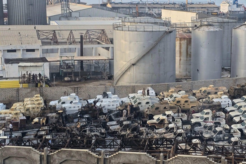 Damaged military vehicles, reportedly sent by the United Arab Emirates to support Southern Transitional Council separatist forces, following an air strike carried out by the Saudi-led coalition in the port of Mukalla, southern Yemen. Photo: AFP