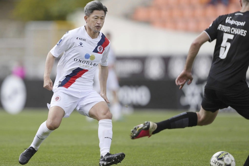 Kazuyoshi Miura (left) playing for U.D Oliveirense against Academico de Viseu FC in Portugal when he was 56 years old. Photo: AP