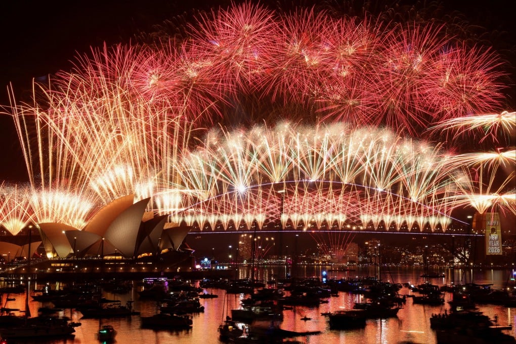 Fireworks explode over Sydney Harbour Bridge to mark the New Year. Photo: Reuters