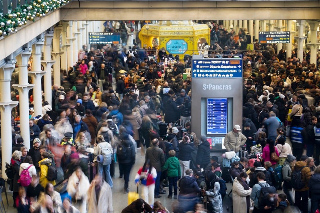Travellers queue for Eurostar services at St Pancras International station in London on Tuesday. Photo: AP