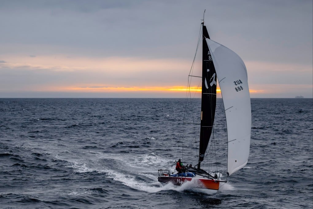 Min River, sailed by Jiang Lin and Alexis Loison, approaches the finish of the Sydney Hobart Yacht Race. Photo: AP