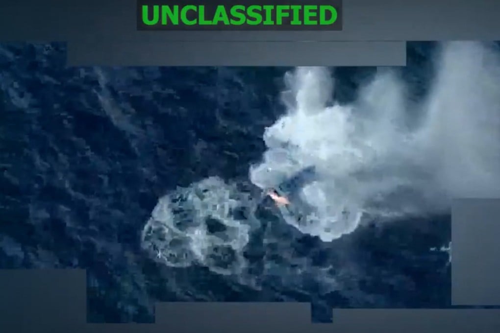 A strike on one of three boats alleged to be trafficking drugs. Three people are said to have killed, as others jumped overboard. Photo: US Southern Command via AFP